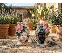 Generico Coppia teste di moro di Caltagirone in ceramica siciliana con tulipani rosa realizzate a mano H20 cm