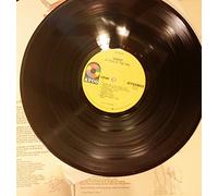 Genesis - A trick of the tail (1975) / Vinyl record [Vinyl-LP]