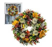 Ghirlanda autunnale, corona per porta d'autunno, ghirlande da cucina, con foglie di eucalipto e zucche verdi come festa