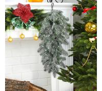 Ghirlanda di Natale con gocce di neve artificiali, rami pino e aghi pino