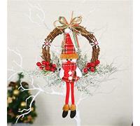 Ghirlanda di Natale Davanti alla Porta è appesa la Ghirlanda di Natale alla, l'ornamento di Natale, la Ghirlanda di Natale