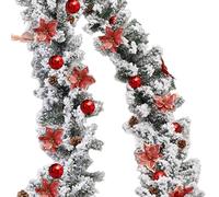 Ghirlanda di pino verdi di cedro nevoso artificiale con coni di pino e fiori rossi per il muro del mantello da tavolo da festa di Natale