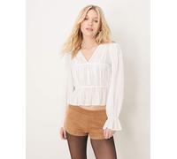 Gina Tricot - Blusa a punto smock bianca arricciata con allacciatura sul davanti-Bianco L