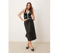 Gina Tricot - Gonna midi a ruota nera con fondo voluminoso a palloncino-Nero L