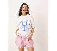 Gina Tricot - T-shirt oversize a maniche corte bianca con grafica "Mykonos Beach"-Bianco L
