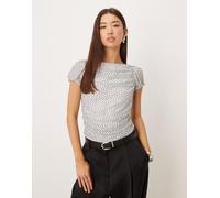 Gina - Tricot - Top a maniche corte a sbuffo in rete bianco a pois neri XL