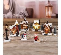 Decorazione natalizia: villaggio di Natale con decorazioni innevate e luci LED nelle casette, 3D