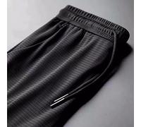HJUGHPN Piumino da uomo casual pantaloni traspiranti stile business sottile sezione in rete tinta unita pantaloni maschili (nero caviglia tighteni, M)