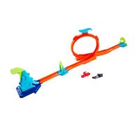 Hot Wheels Action Stunt Track Surprise, circuito portatile con lanciatore e sorpresa d'urto, acrobazie emozionanti per bambini dai 4 anni in su