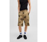 HUGO Bermuda baggy fit in twill di cotone elasticizzato con stampa con fiori di ibisco - Style Damo242, 50542159 Beige a motivi 30