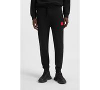 HUGO Pantaloni della tuta in terry di cotone con etichetta con logo rossa - Style Doak212, 50447963 Nero M
