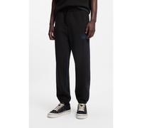 HUGO Pantaloni della tuta in terry di cotone con logo e cuciture a contrasto - Style Notharos, 50553508 Nero L