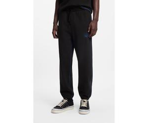HUGO Pantaloni della tuta in terry di cotone con logo e cuciture a contrasto - Style Notharos, 50553508 Nero S