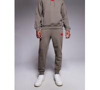 HUGO Red - Doak - Joggers color grigio medio con etichetta del logo e fondo elasticizzato in coordinato W32