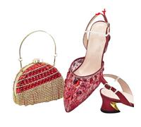 I classici italiani di colore rosso progettano le scarpe e la borsa delle donne africane insieme con il cristallo brillante per la festa nuziale delle donne