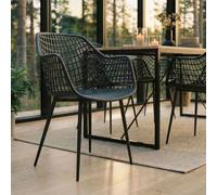 IDIMEX Sedia da giardino Lucia, set da 4 pezzi, comode sedie da pranzo in plastica, colore nero, pratica sedia con bracciolo