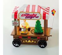 Il Mondo dei Carillon Luna park con bancarella di dolciumi e albero