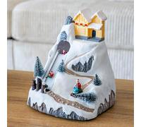 IlGruppone Giostra Natalizia con Scivolo e Casa Illuminata Villaggio di Natale con Luci LED, Movimento e Musica Decorazione Natalizia da Tavolo Funzionamento a Batterie (3xAA) 21 cm