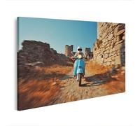 islandburner Prime Quadro su tela con la Vespa attraverso le vecchie rovine - Tela 100 x 57 cm