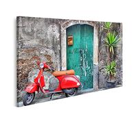 islandburner Quadro su tela Vespa rossa davanti a una vecchia porta in Italia Quadri Stampe per soggiorno ufficio