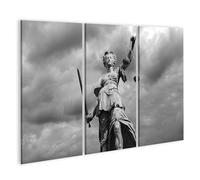 islandburner Stampa su tela Statua della giustizia sotto il cielo drammatico - Tela 130 x 80 cm - 3 pezzi
