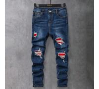 Jeans skinny neri in denim con strappi, pezze rosse e effetto vissuto, adatti a ragazzi adolescenti, morbidi e comodi per l'uso quotidiano e in tutte le stagioni, abbigliamento estivo per ragazzi adol