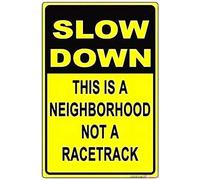 JINKAIRUI Cartello stradale con scritta "Slow Down This is A Neighborhood Not A Racetrack" Humor Jokes Metal Tin Sign Wall Art Decor Safety Warning Signs for Outdoor & Indoor Office Sign 20,3 x 30,5