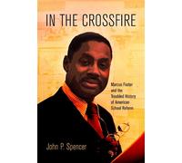 John P. Spencer In the Crossfire (Tascabile)