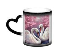 KDKJEDPEAF Tazza magica che cambia colore con cigni bianchi con albero floreale rosa, 325 ml, tazza da caffè in ceramica sensibile al calore, rivela l'immagine a sorpresa, regalo per lei, per lui