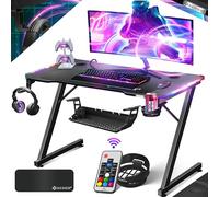 KESSER® Scrivania da Gioco LED - 120 x 60 cm, forma di Z, Gancio per Cuffie e Rivestimento in Carbonio, Ergonomica per PC, con Portabicchieri, Nero Carbon