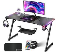 KESSER® Scrivania da Gioco LED - 140 x 60 cm, Scrivania a forma di Z, Gancio per Cuffie e Rivestimento in Carbonio, Ergonomica per PC, con Portabicchieri, Nero Carbonio