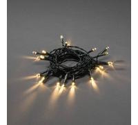 Konstsmide Catena luminosa a LED, con interruttore on/off, timer da 6 ore, 50 diodi bianchi caldi, funzionamento a batteria, interno, cavo verde, 4 x AA 1,5 V (esclusi) - 1470-100