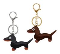 KRYMSON 2 ciondoli a forma di bassotto, in pelle, per gli amanti degli animali, come decorazione per borse e chiavi (nero, marrone scuro), nero, marrone scuro, 12 * 8,5 cm