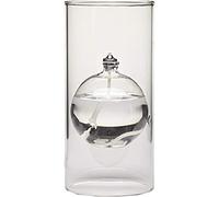 La moderna lampada a olio in vetro trasparente Transcend è un regalo unico per lei. La candela a olio Bliss sembra galleggiare nel portacandele Hurricane.