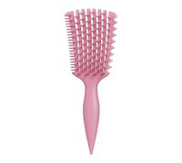 La spazzola districante leviga i capelli con legami lucidi che levigano i capelli