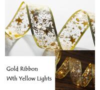 La stringa di luci di Natale a nastro illumina l'albero di Natale a LED per