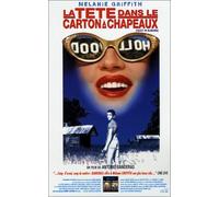 La tete dans le carton a chapeaux