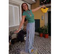 Labelrail x Rebecca Olivia - Pantaloni con fondo ampio a righe multicolore con allacciatura laterale 34