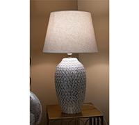 Lampada da tavolo in resina con eleganti decorazioni geometriche in rilievo Dimensioni 35xh 65 cm in resina e paralume in tessuto bianco grigio