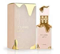 Lattafa - Eclaire EDP Spray da 100 ml di Lattafa La fragranza si apre con note alte di caramello, latte e zucchero che affascinano i sensi con la sua dolcezza ricca e cremosa, che ricorda un dolce