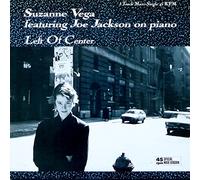 Left of center (1986, feat. Joe Jackson, b/w 'Cracking [live]', 'Black widow station [live]') / Vinyl Maxi Single [Vinyl 12'']