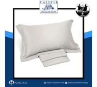 Lenzuola in raso di cotone Caleffi sopra sotto con angoli e federe per cuscini