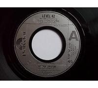 Level 42 - LEVEL 42 Lessons in love 7" vinyl Large centre hole