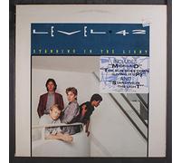 LEVEL 42 - standing in the light