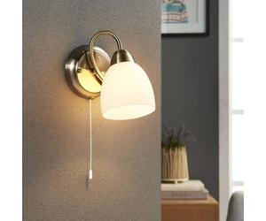 Lindby applique Mael, altezza 20 cm, ottone antico, interruttore a strappo LINDBY