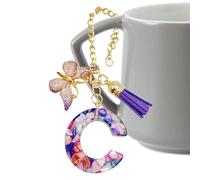 Liqzirtu Ciondolo con manico a tazza, ciondolo a forma di lettera con farfalla e nappa, ciondolo moderno alla moda per zaino, portachiavi con iniziale per ragazze, scuola, lavoro, palestra all'aperto