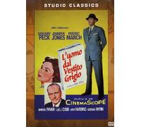 L'Uomo Dal Vestito Grigio