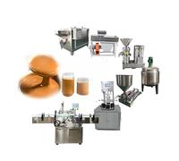 Macina burro di arachidi compatto commerciale con design in acciaio inossidabile per uso alimentare per macinare efficacemente noci e semi, ideale per piccole configurazioni di lavorazione degli