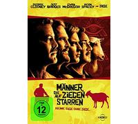 Männer, die auf Ziegen starren