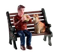 Magie di Natale Pausa Pranzo con Il Cane seduti sulla panchina Personaggio in poliresina per Villaggio di Natale